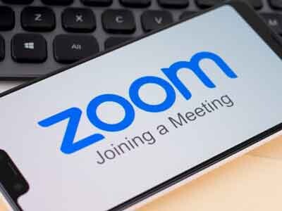 Zoom, stock, Zoom lowered its annual profit and revenue forecast
